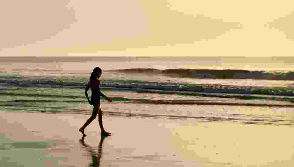 Girl walking on seashore 2945744