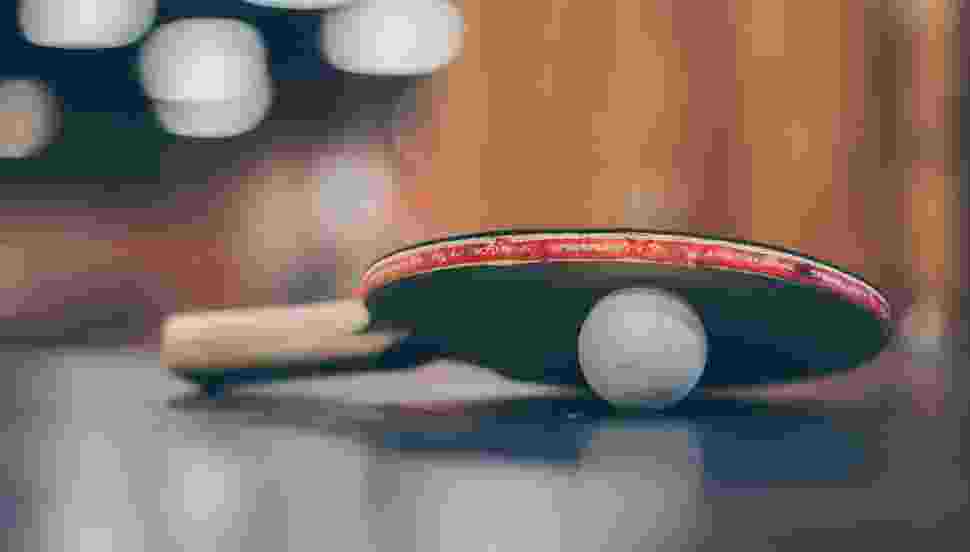 Selective focus photo of table tennis ball and ping pong 976873